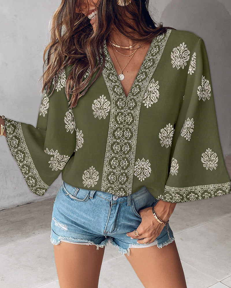 V-ringad Blus