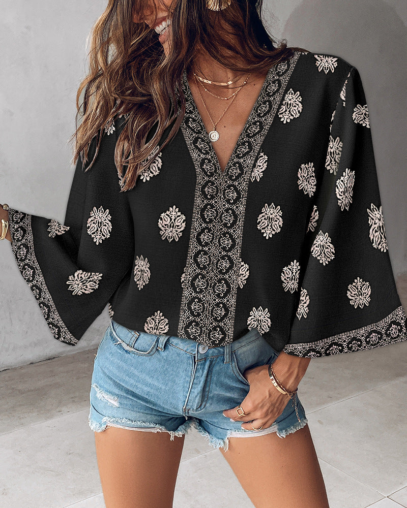 V-ringad Blus